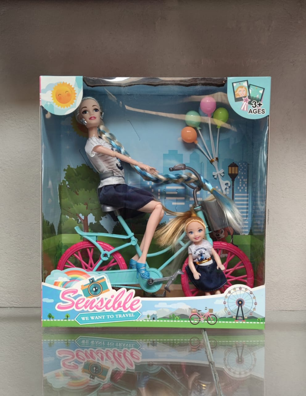 MUÑECA PASEO EN BICICLETA